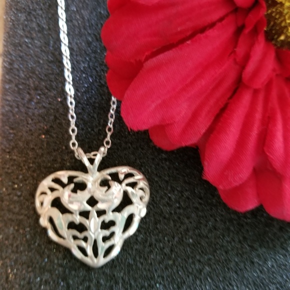 Avon Jewelry - Sterling silver pendant and chain